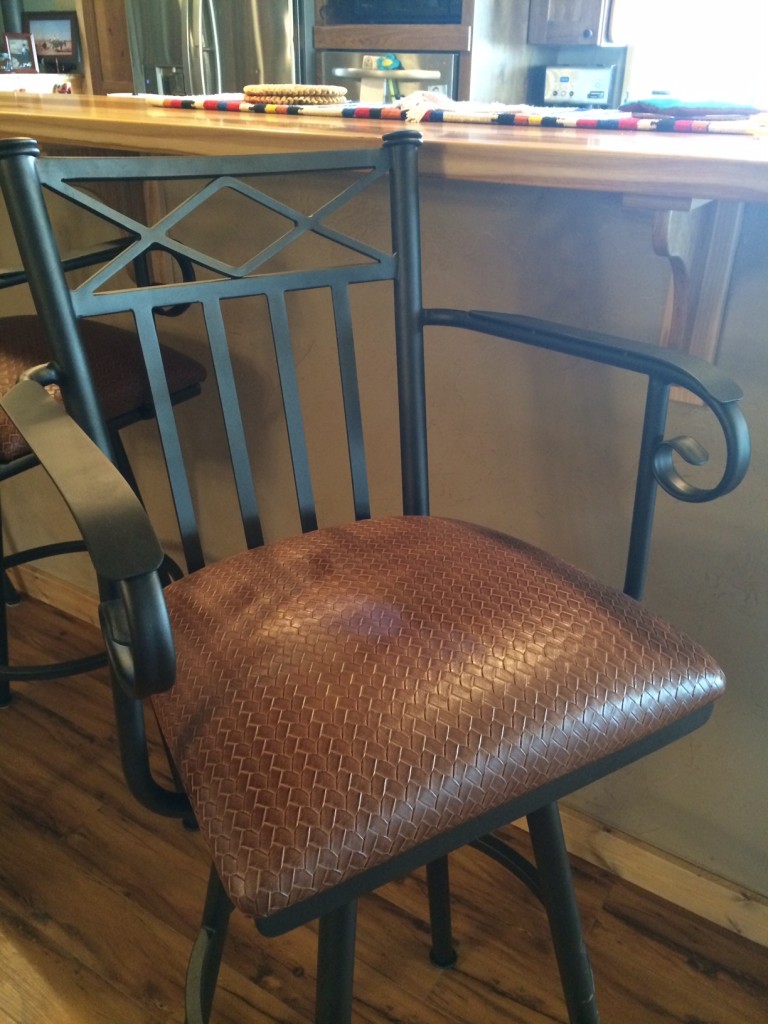 The upholstery for the barstools was chosen with the look of a tooled saddle in mind. They turned out beautifully!